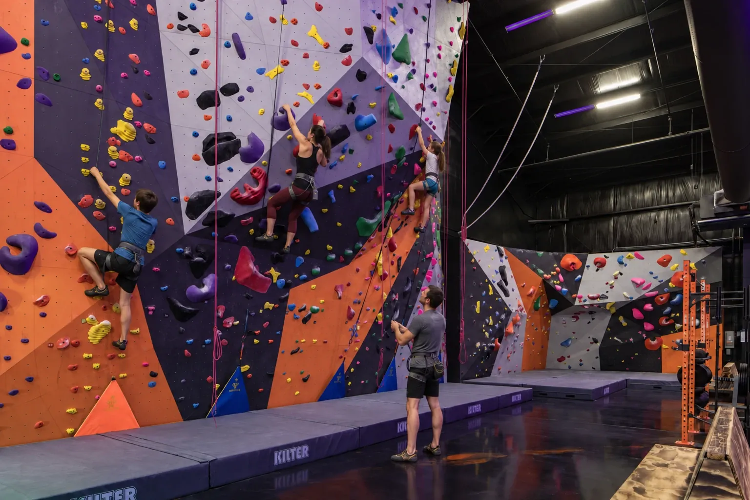 Climbers on colorful routes at Fort Rock